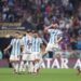 LUSAIL CITY, QATAR - DECEMBER 18: Lionel Messi of Argentina celebrates with teammates in the penalty shootout during the FIFA World Cup Qatar 2022 Final match between Argentina and France at Lusail Stadium on December 18, 2022 in Lusail City, Qatar. (Photo by Julian Finney/Getty Images)